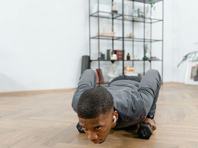 Close-up of a person's focused expression during a workout session.